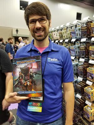 James Sutter at GenCon50 with his creative project the Starfinder RPG